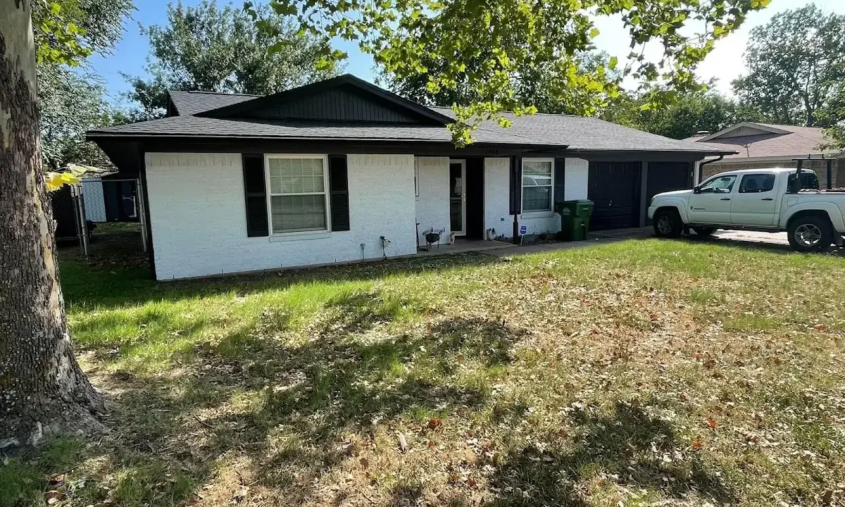 Professional roofing crew working on a residential roof in Lakeside